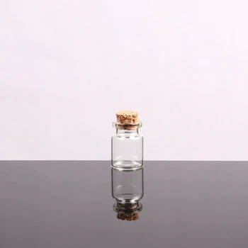 Малки бутилки с пробковыми тапи, малки флакони, малки прозрачни стъклени буркани с капаци за съхранение на
